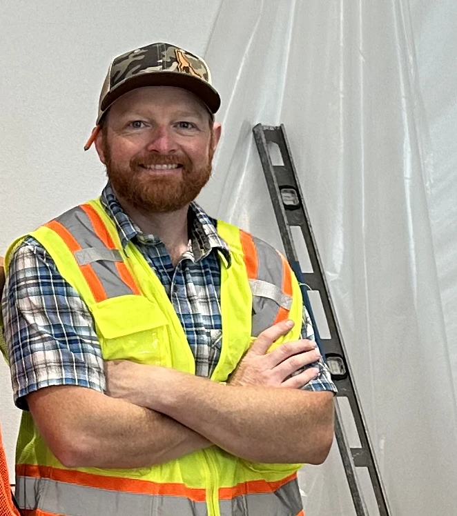 Portrait of Aram Reeves on a construction site