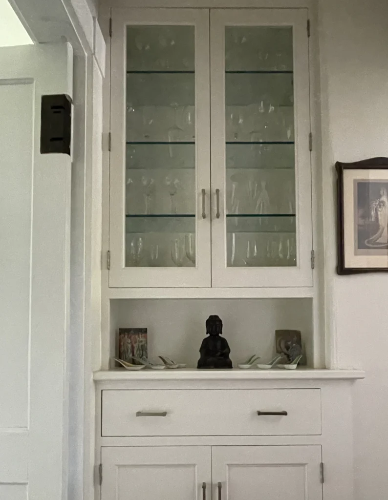 built-in cabinet with glass doors